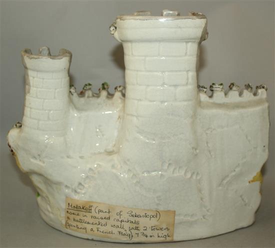 Three Staffordshire porcelaneous models of Crimean War Castles, c.1855, 20 - 24.5cm